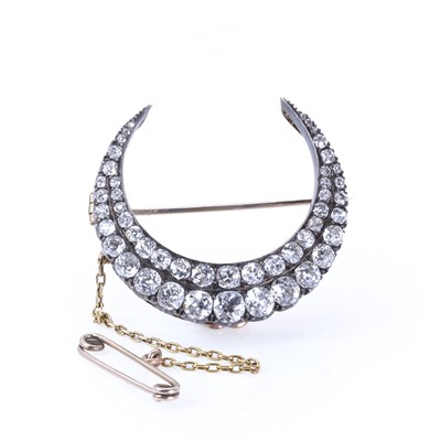 Lot 23 - A late Victorian two row diamond closed crescent brooch, c.1890