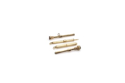 Lot 61 - A collection of 9ct gold toothpicks