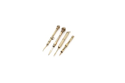 Lot 61 - A collection of 9ct gold toothpicks