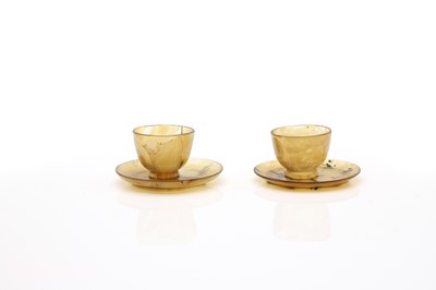 Lot 232 - A pair of Chinese agate cups and saucers