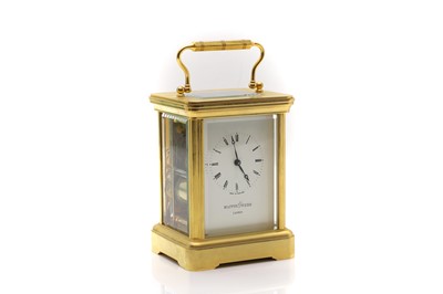 Lot 136 - A brass carriage clock