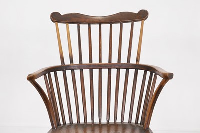 Lot 507 - An ash and elm comb-back Windsor chair