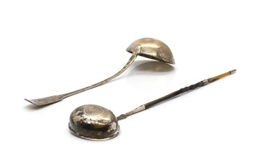 Lot 21 - A Georgian fiddle pattern silver ladle