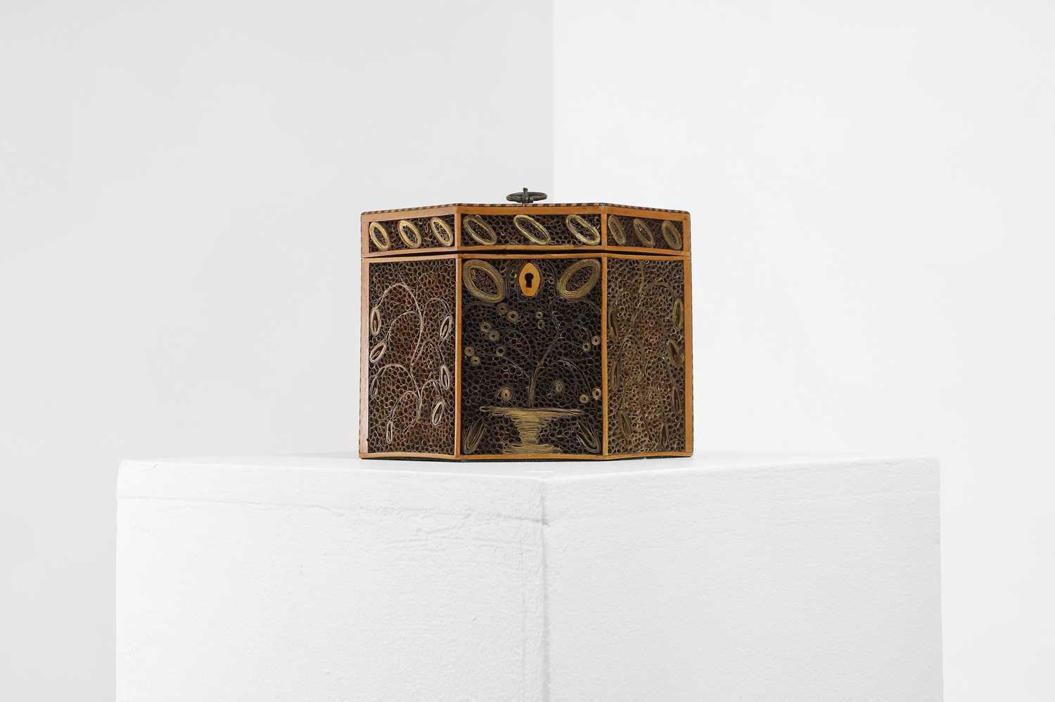 Lot 288 - A paper-scroll tea caddy