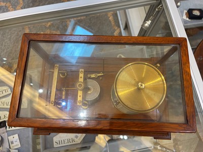 Lot 281 - A cased seven-day recording barograph