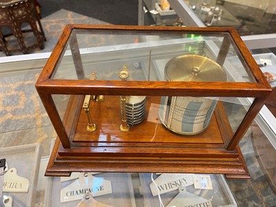 Lot 281 - A cased seven-day recording barograph