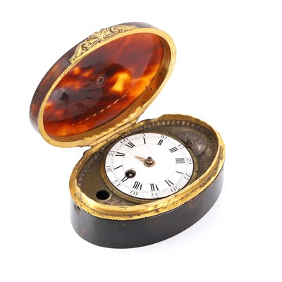 Lot 301 - A tortoiseshell cased table timepiece