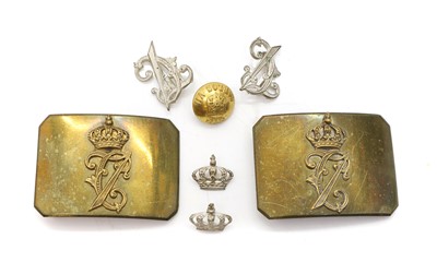 Lot 435A - A pair of brass buckles