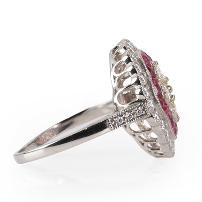 Lot 235 - A ruby and diamond quatrefoil cluster ring
