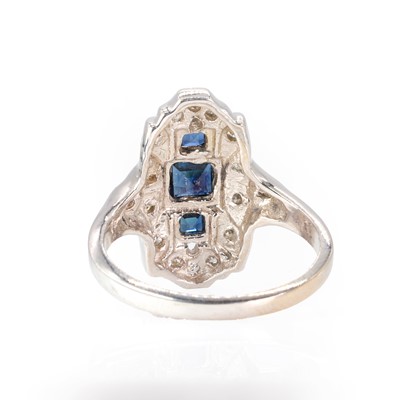 Lot 143 - A 14ct white gold Art Deco style sapphire and diamond ring