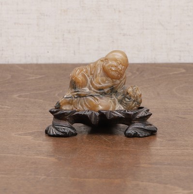 Lot 106 - A Chinese soapstone carving