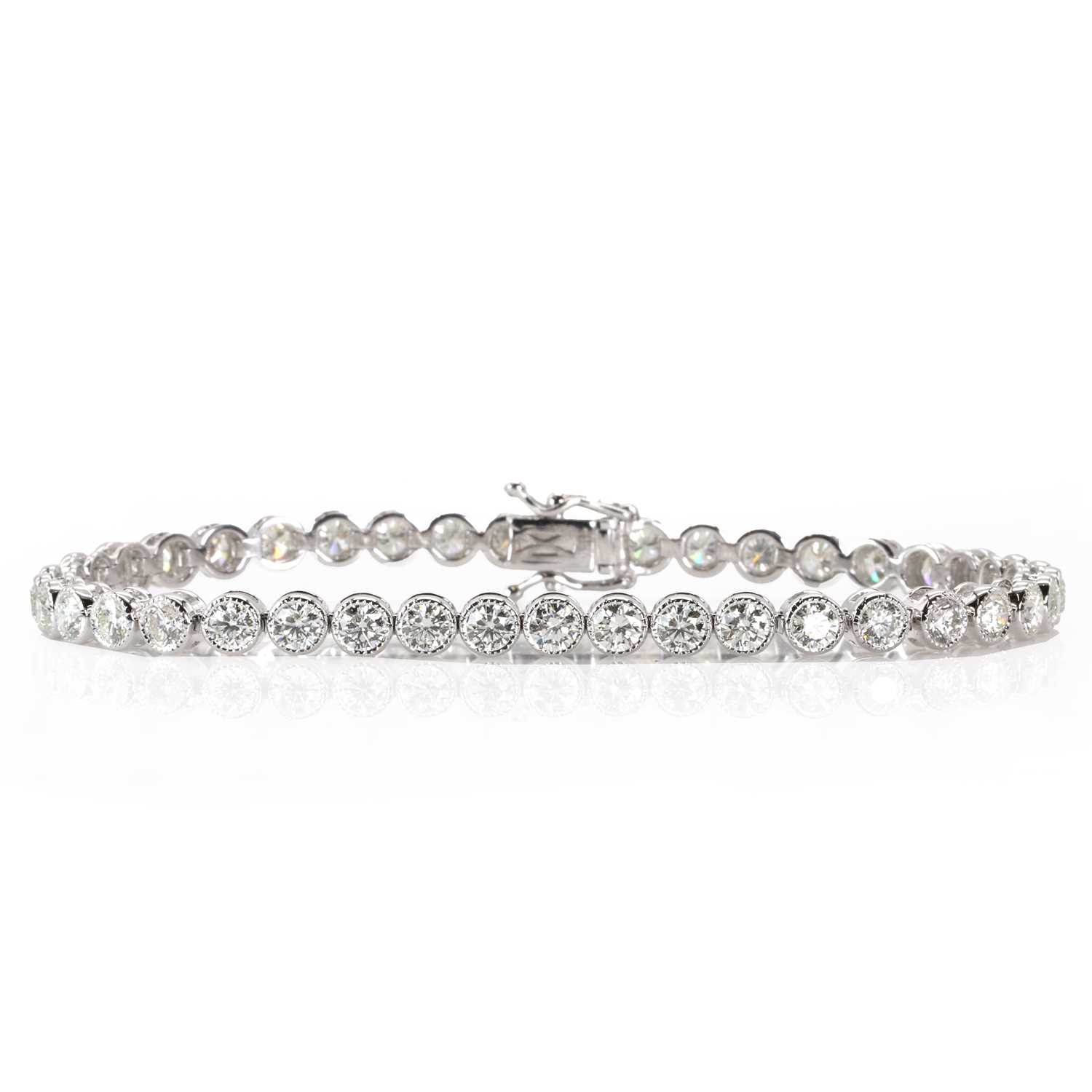 Lot 223 - A white gold diamond line bracelet