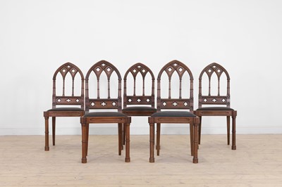 Lot 303 - A set of five Gothic Revival walnut dining chairs