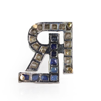 Lot 67 - An Art Deco sapphire and diamond monogram