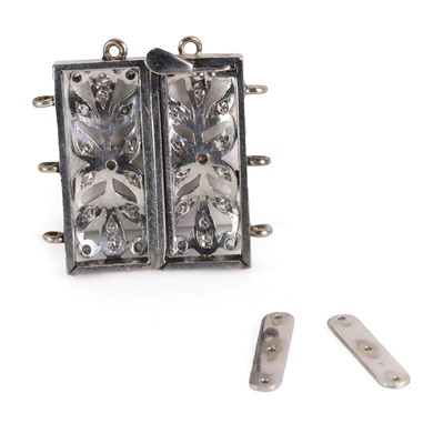 Lot 219 - A three row diamond set pearl clasp