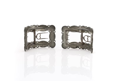 Lot 97 - A pair of bright-cut pewter shoe buckles