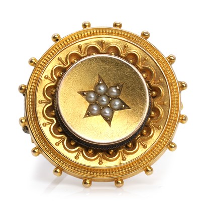 Lot 19 - A Late Victorian 15ct gold shield form brooch