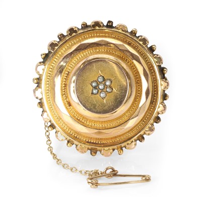 Lot 17 - A late Victorian 9ct gold shield form brooch, by Arthur and Co