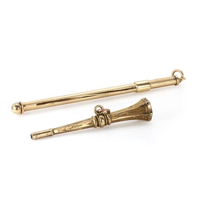 Lot 483 - A 9ct gold swizzle stick and a gold cased watch key