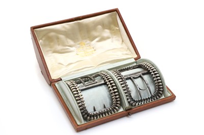 Lot 104 - A cased pair of George III silver shoe buckles