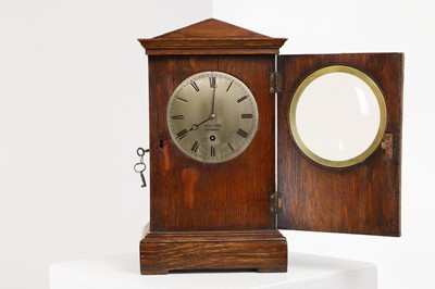 Lot 271 - A Regency oak-cased mantel clock