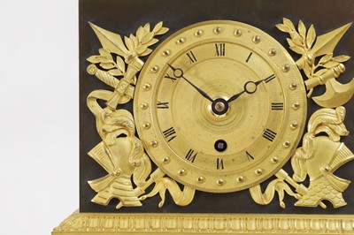 Lot 352 - An Empire-style patinated and gilt-bronze mantel clock