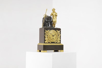 Lot An Empire-style patinated and gilt-bronze mantel clock