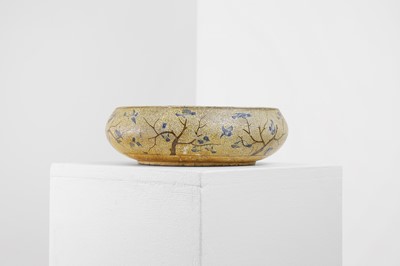 Lot 378 - A lacquered papier mâché bowl
