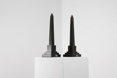 Lot A pair of Ashford black marble obelisks