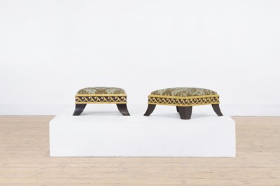 Lot 422 - A pair of small ebonised and parcel-gilt footstools