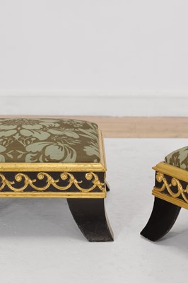 Lot 422 - A pair of small ebonised and parcel-gilt footstools