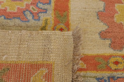 Lot 105 - An Oushak wool carpet