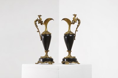 Lot 644 - A pair of Louis XV-style ormolu and black marble ewers