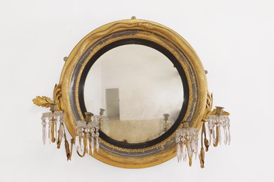 Lot 377 - A Regency carved giltwood convex mirror