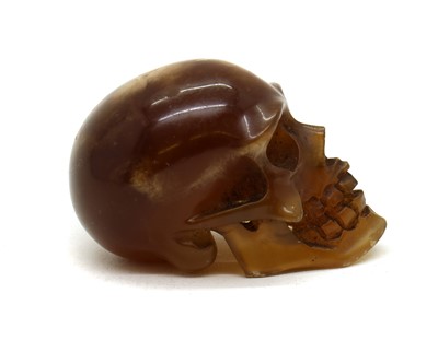 Lot 269 - A Victorian agate memento mori cane topper