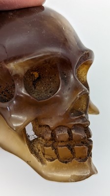 Lot 269 - A Victorian agate memento mori cane topper