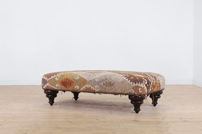 Lot 528 - A large kilim-upholstered footstool by George Smith