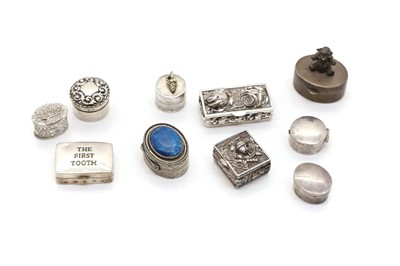Lot 61 - A group of silver pill boxes