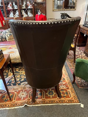 Lot 142 - A George IV mahogany barrel-back armchair