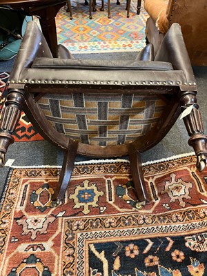 Lot 142 - A George IV mahogany barrel-back armchair