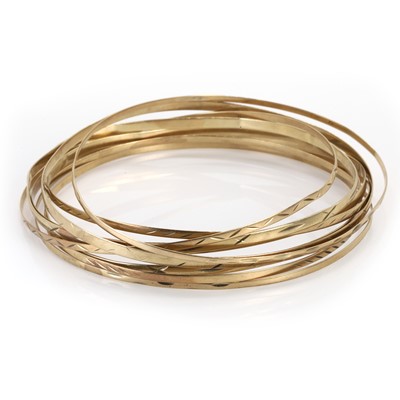 Lot 329 - A group of gold bangles