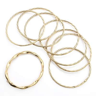 Lot 381 - A group of gold bangles