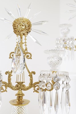 Lot 382 - A pair of cut-glass and gilt-bronze candelabra