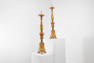 Lot 223 - A pair of polychrome-painted pricket candlesticks