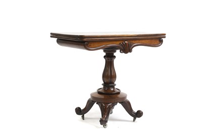 Lot 588 - A Victorian mahogany tea table