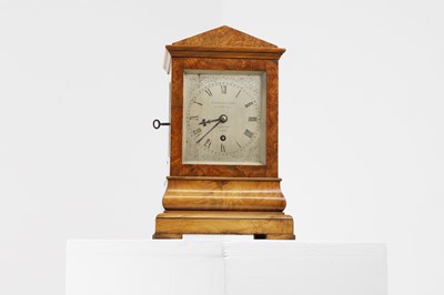 Lot 282 - A walnut library clock
