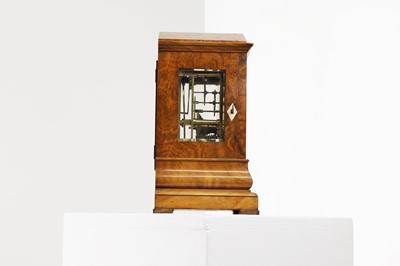 Lot 282 - A walnut library clock