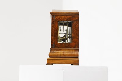 Lot 282 - A walnut library clock