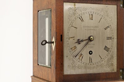 Lot 282 - A walnut library clock