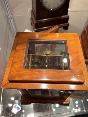 Lot 286 - A satinwood library clock